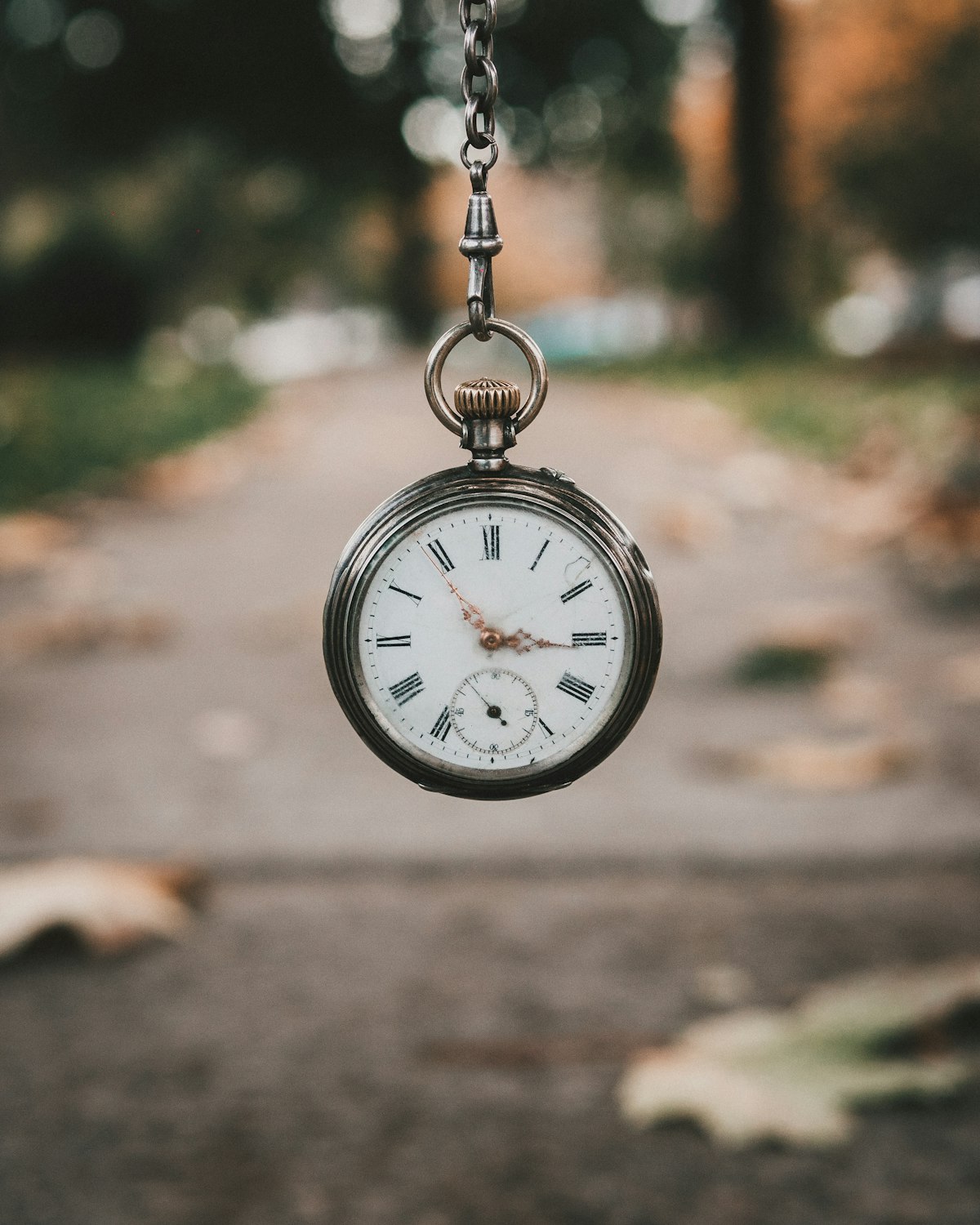 Antique silver pocket watch with visible craftsmanship detail