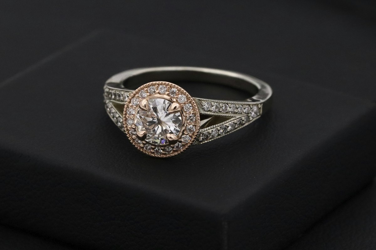 Vintage diamond ring showing old European cut stone and period setting