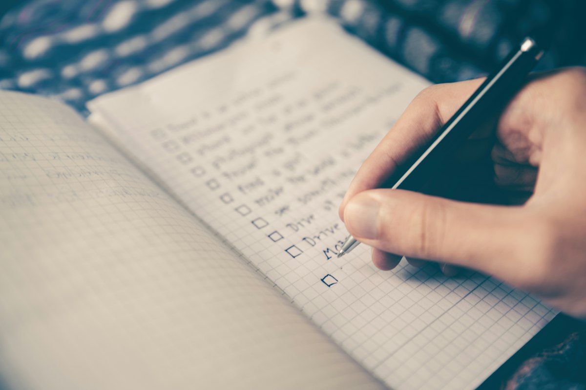Notebook and checklist for cataloguing estate items