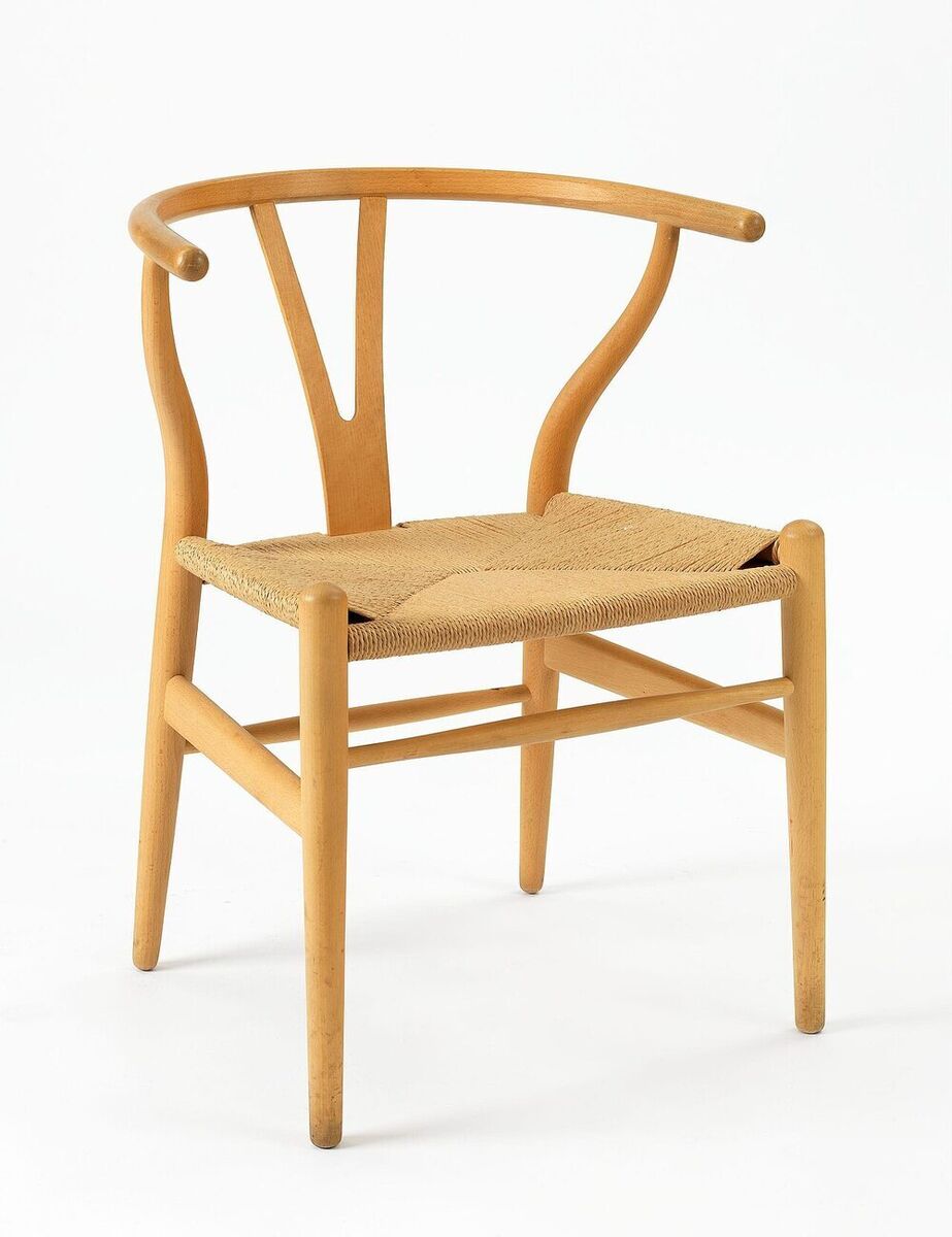 Hans Wegner Wishbone chair showing the Y-back, tapered legs and paper-cord seat