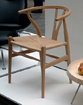Wishbone chair in the round, a form widely copied by later “MCM-style” reproductions